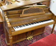 Kimball console piano, pecan